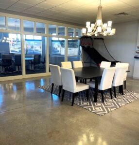 Elegant and modern Lobby with table ay American Eagle Title in Norman.