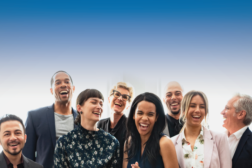 Group of people laughing together with blue background